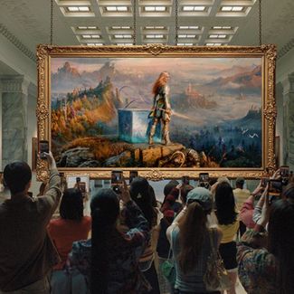 People taking pictures in an art gallery but the image is Laufey from God of War