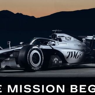 Cadillac F1 car with 'The Mission Begins'