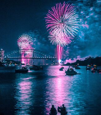 fireworks over the harbor in sydney australia during new years eve