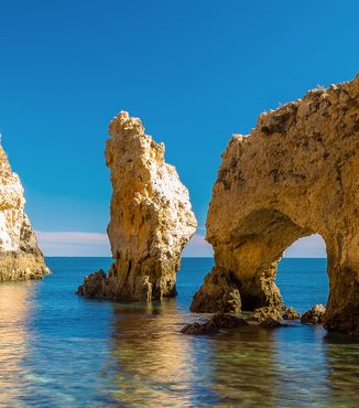 coastal caves along the ocean in lagos portugal