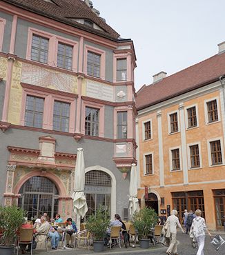 crowds of people walking around gorlitz city center in germany