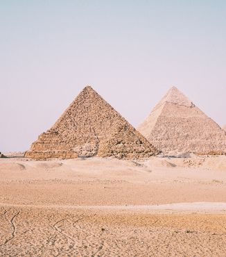 three pyramids in desert in egypt
