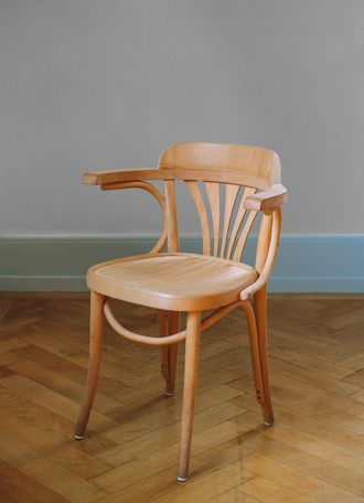 Picture of a chair, as we don't yet have an image of this person to show you