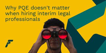 A man peers at you through red tinted binoculars, as you search for interim legal professionals