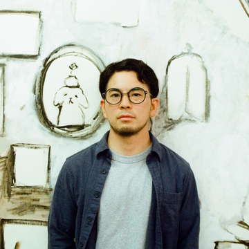 Yuichi Hirako stands in front of his large scale painting