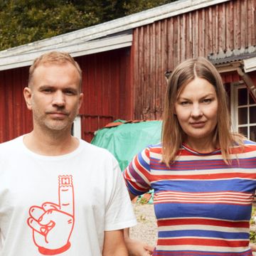 Nathalie Djurberg and Hans Berg standing outdoors together
