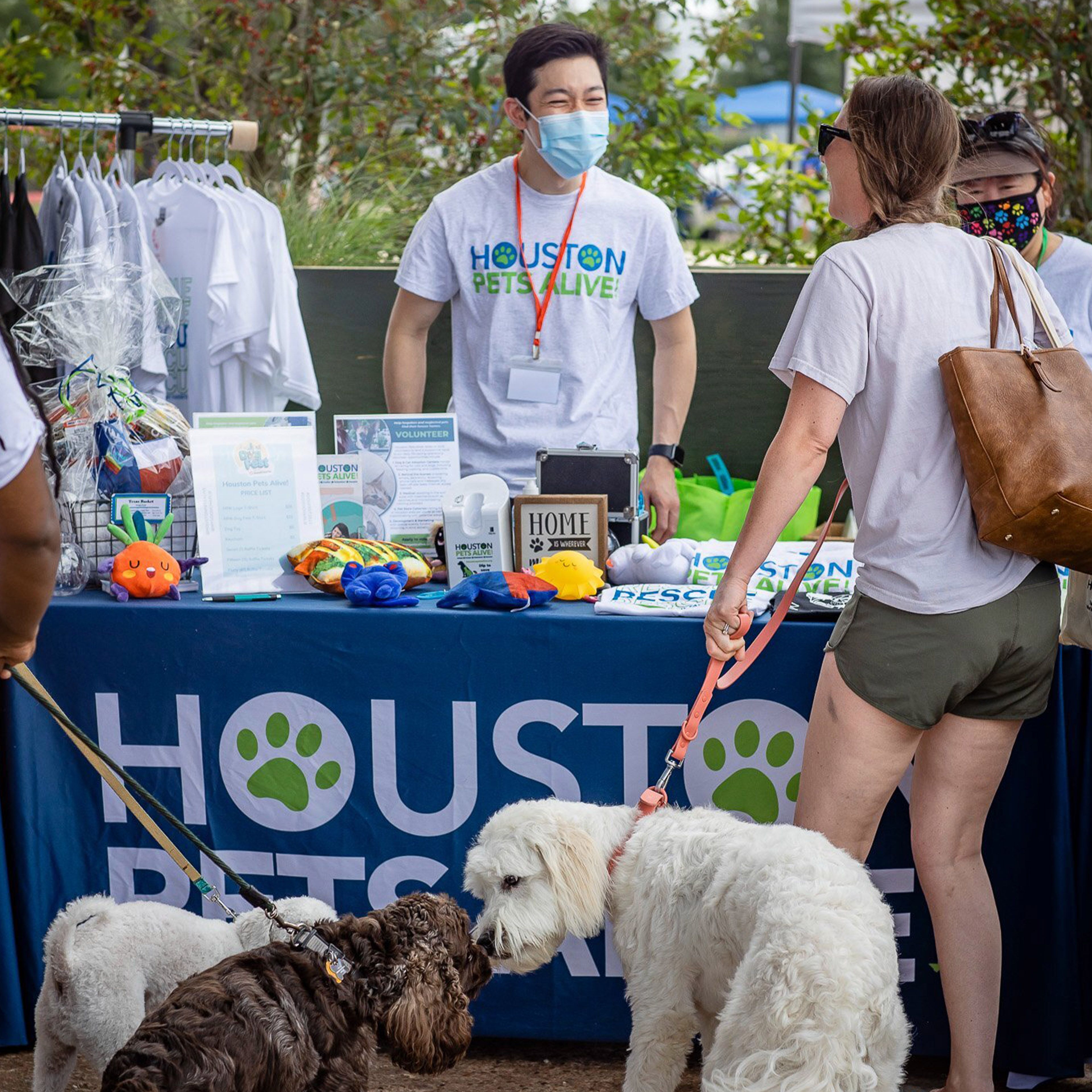 People, dogs, and volunteers at Houston Pets Alive dog fest.