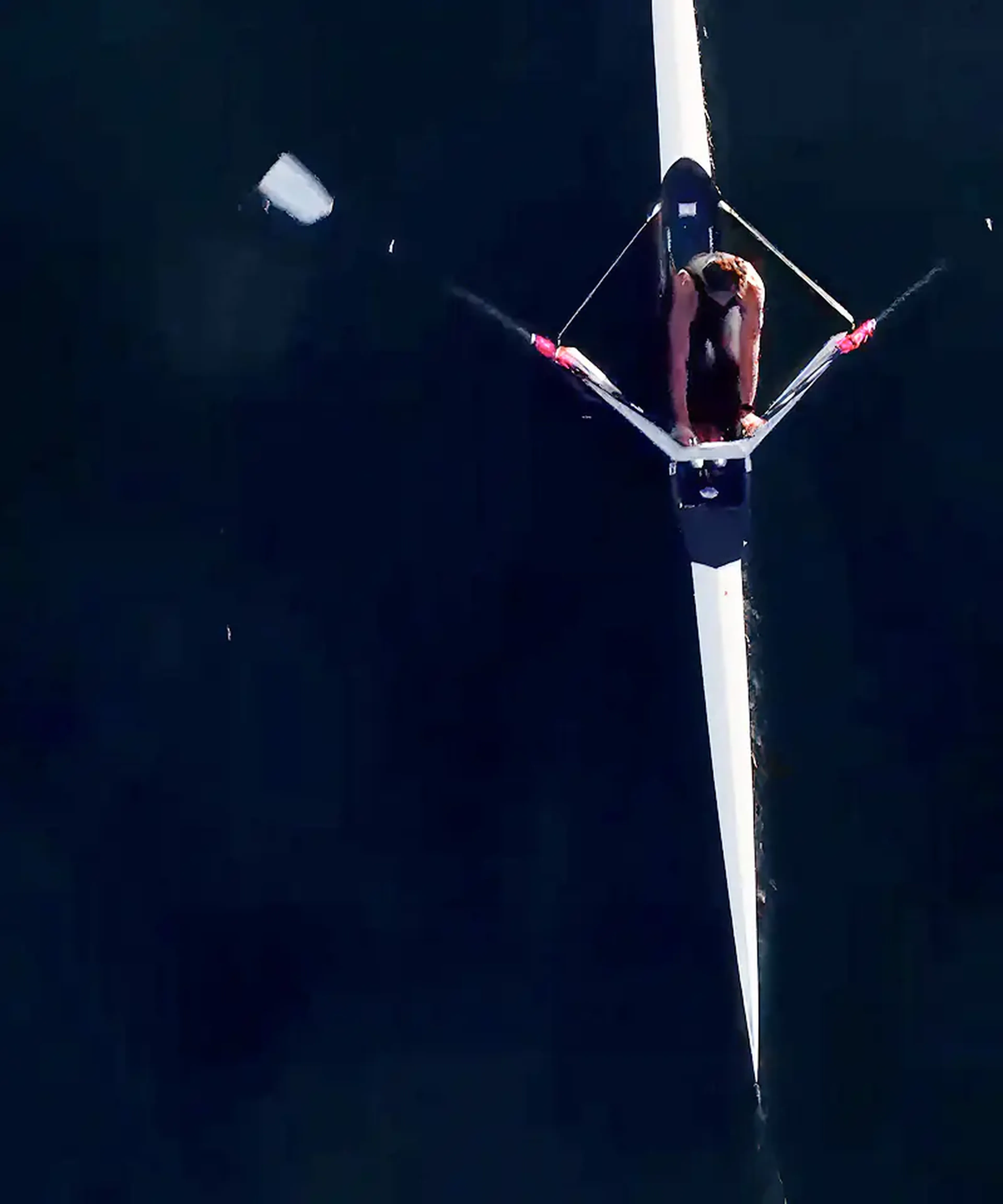 Aerial view of a rower on dark water, from the Sound of Samsung campaign