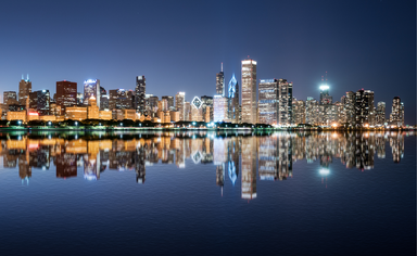 Chicago night skyline across Lake Michigan
