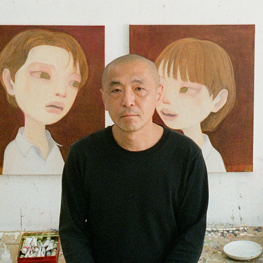 Portrait photo of Hideaki Kawashima in a black sweater