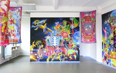 installation view of one large painting surroounded by three hanging tapestries
