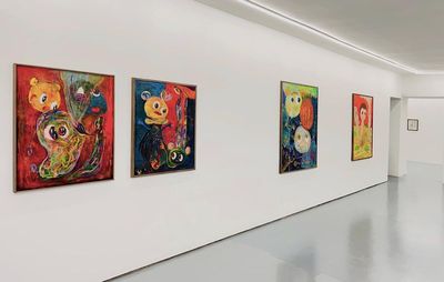 installation view of four colourful paintings hung on a white wall