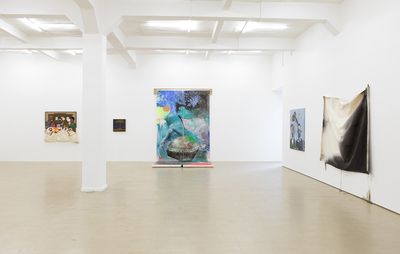 Dada's work displayed in a gallery space