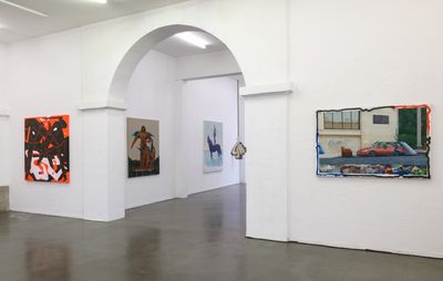 Caleb's artwork displayed in a gallery space