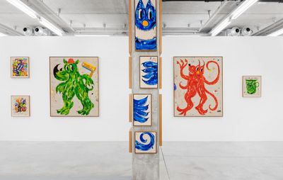 installation view of various distinct paintings by artist Szabolcs Bozo hung on white walls