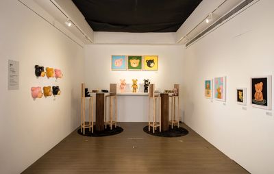 installation view of lots of teddy bears in various two and three dimensional forms 