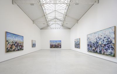 installation view of large white space with five large paintings hung up