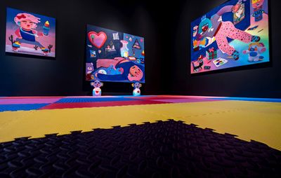 installation view of black gallery walls where three colourful cartoon paintings hang