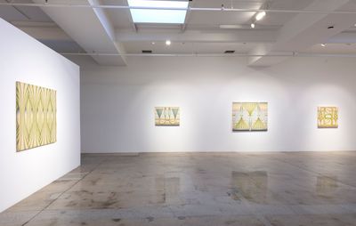 Artworks hung in a white gallery space