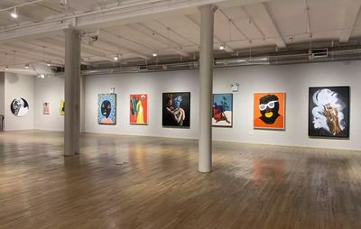 Gallery wall with nine paintings by various artists