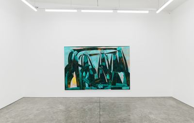 Green painting in middle of gallery wall
