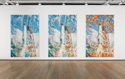 installation view of three large-scale rocket paintings