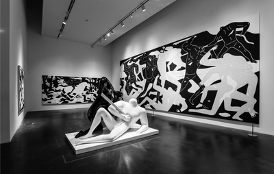 installation view of two large monochrome paintings and a monochrome sculpture in the centre of the room