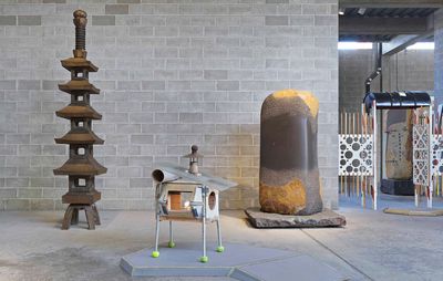 space-meets-tea-ceremony sculptures in gallery space with breezeblock walls