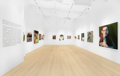 installation view of a group show with a variety of paintings hung on white walls