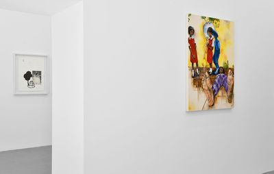 installation view of a white freestanding wall with a rectangular painting hung centrally on it
