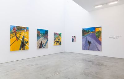 installation view of five bright paintings by artist Deborah Brown