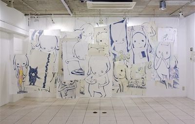 installation view of a white room with multiple hanging blue and white works on paper by Maiko Kobayashi