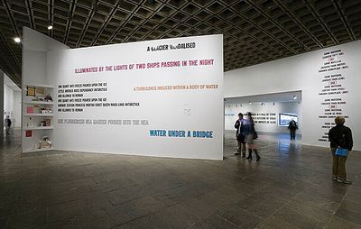 Lawrence Weiner's work displayed in a gallery