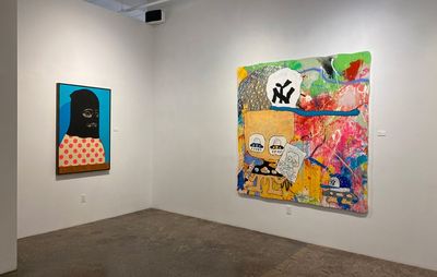 installation view of two brightly coloured paintings