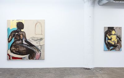 installation view of one large and one small figurative paintings