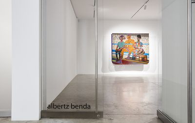 installation view of exhibition with single painting on a white wall behind glass doors