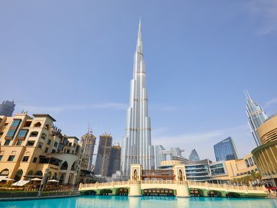 Burj Khalifa skyscraper, Souk al Bahar and Dubai Mall in a sunny day 
