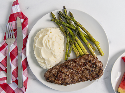 New York Strip Steak with Asparagus, Grilled Watermelon and Idahoan Buttery Homestyle Mashed Potatoes