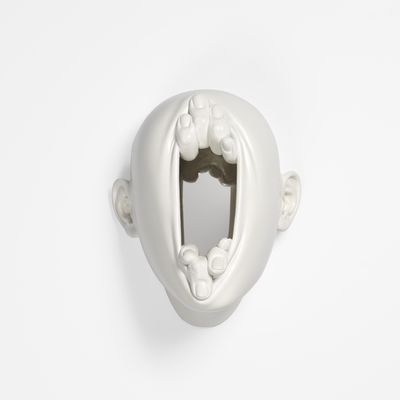  Sculpture of stretched open face with mirror inside, Lucid Dream II by Johnson Tsang