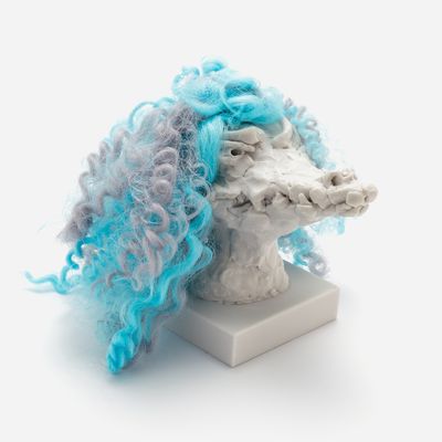 a sculpture of a crocodile head with a custom hair piece in electric blue and grey, Nathalie Djurberg & Hans Berg