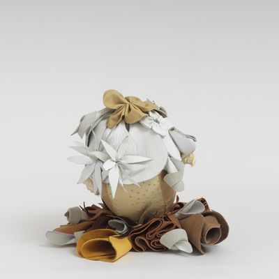 Soft sculpture of leather and cloth, Dove by Tau Lewis