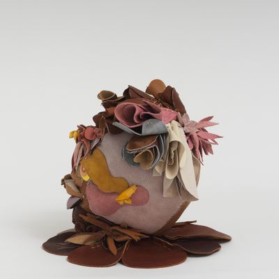 Soft sculpture of leather and cloth, Soleil by Tau Lewis