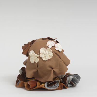 Soft sculpture of leather and cloth, Fawn by Tau Lewis