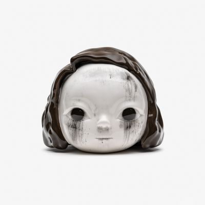big-eyed, glazed ceramic head