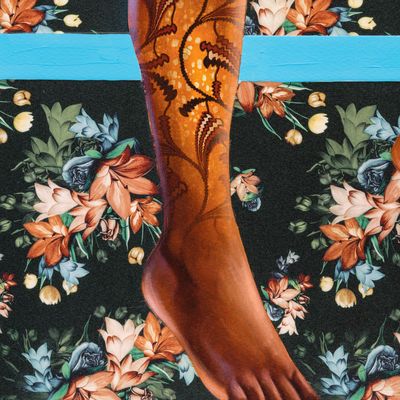up close of leg and foot detail with floral background