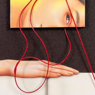 details of red 3D headphones above canvas