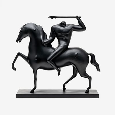 bronze sculpture of a horse and warrior