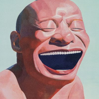 a detail of a laughing man kneeling down into the sea