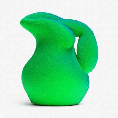 a bright green bulbous pitcher sculpture with tones of blue