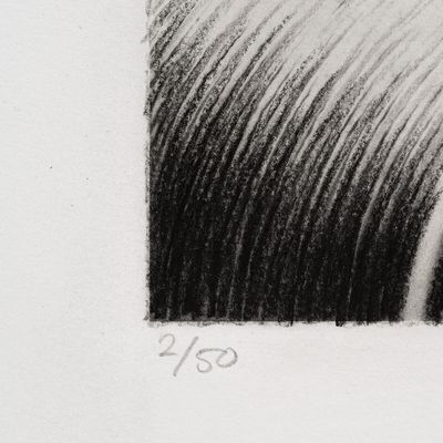 edge of graphite print with edition number